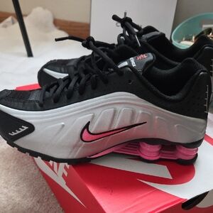 Nike Black and White Sneakers with Pink Accents